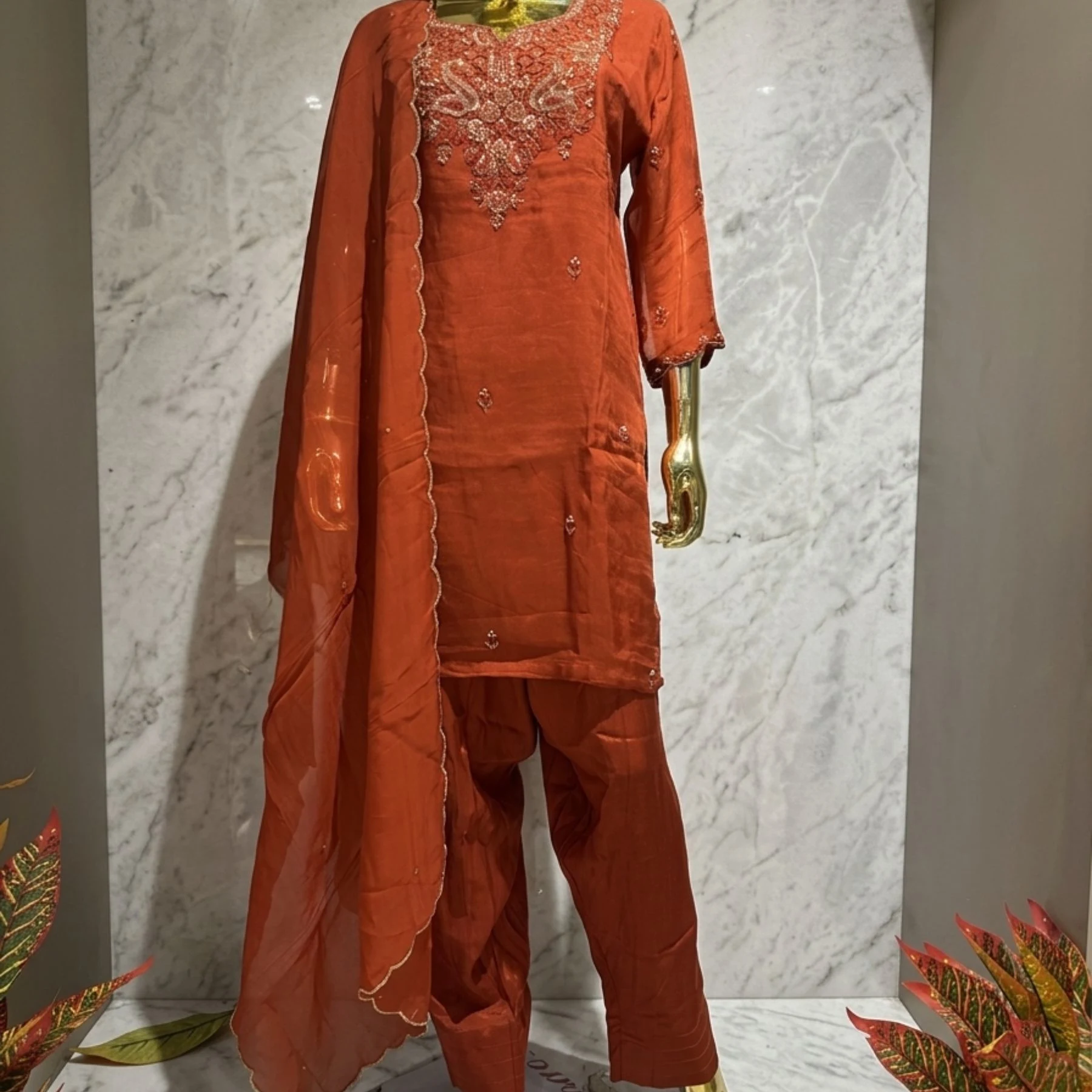 Rust orange organza straight suit with golden pipe work and farshi bottom for women