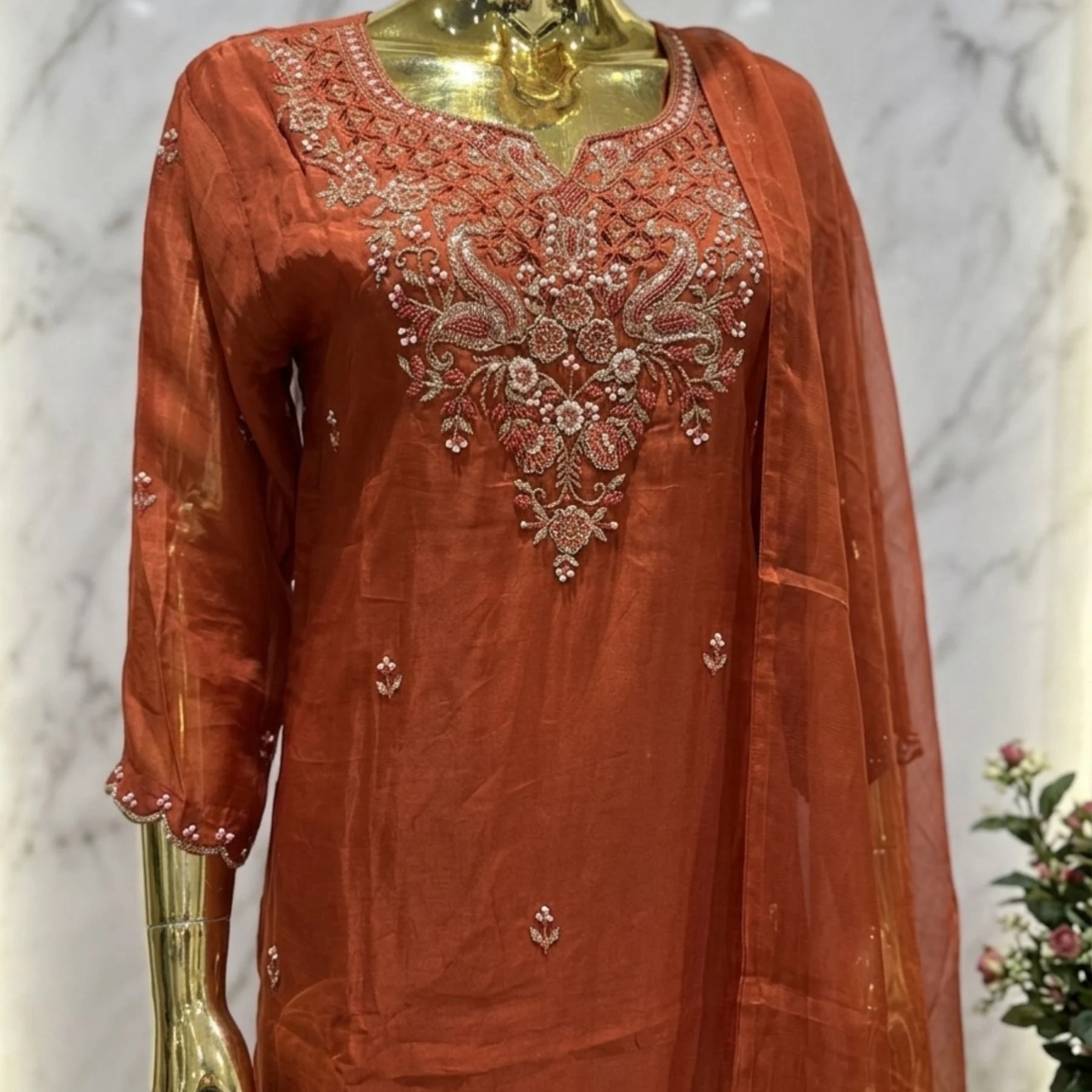Rust orange organza straight suit with golden pipe work and farshi bottom for women