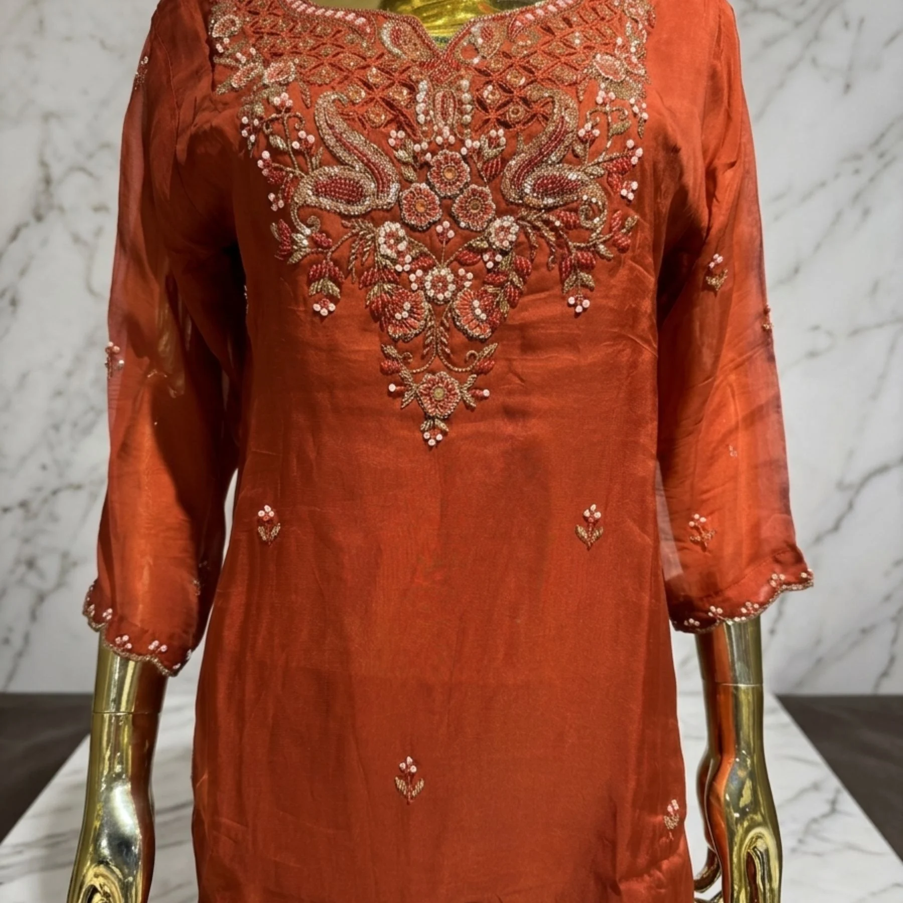 Rust orange organza straight suit with golden pipe work and farshi bottom for women