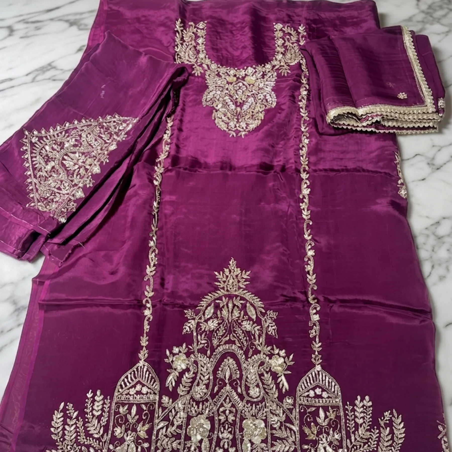 Women’s crepe fabric unstitched suit with pearl work