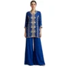 Woman wearing royal blue chinnon pearl work co-ord set