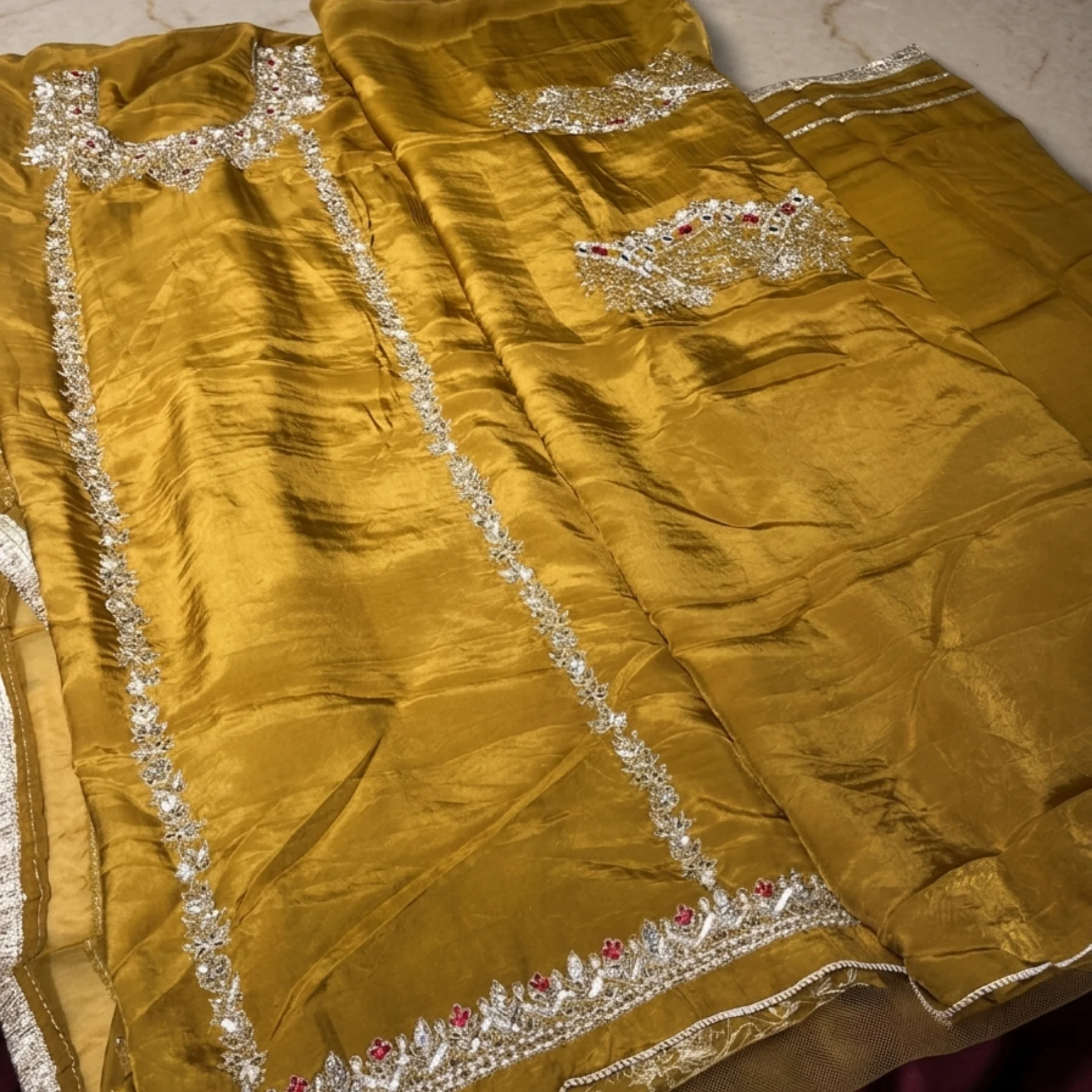 Women’s mustard unstitched suit with dabka work