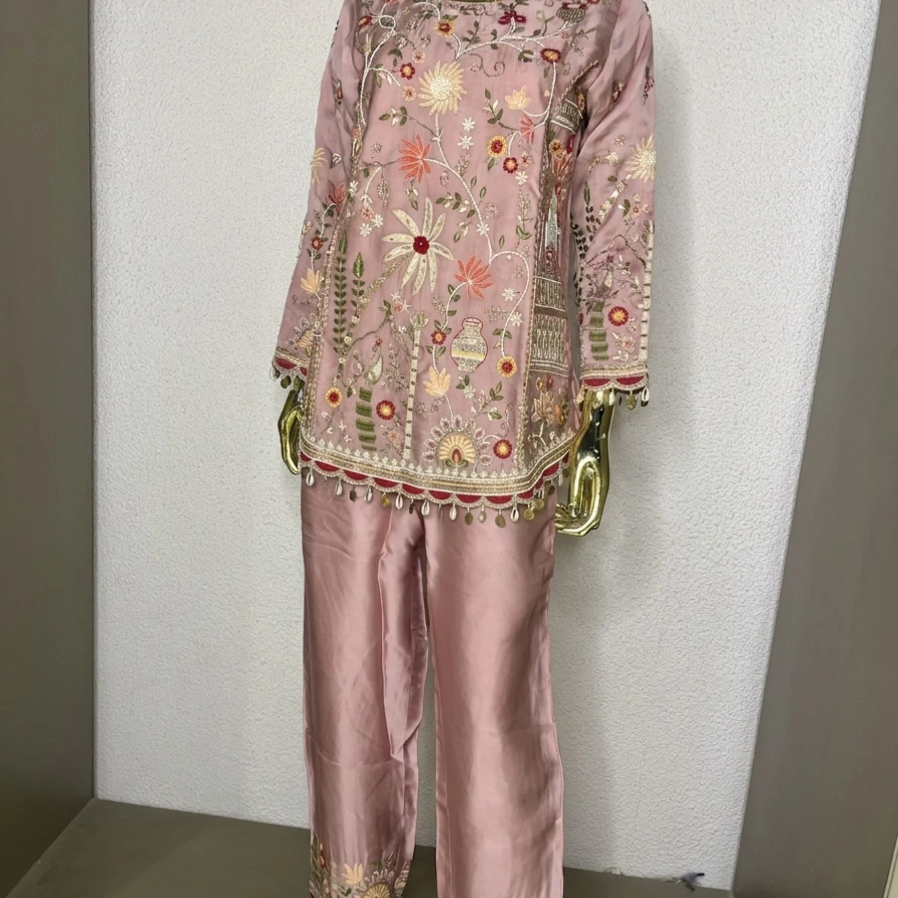 Woman wearing blush pink khadi chanderi suit set with dupatta