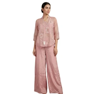 Woman wearing blush pink soft organza embroidered co-ord set