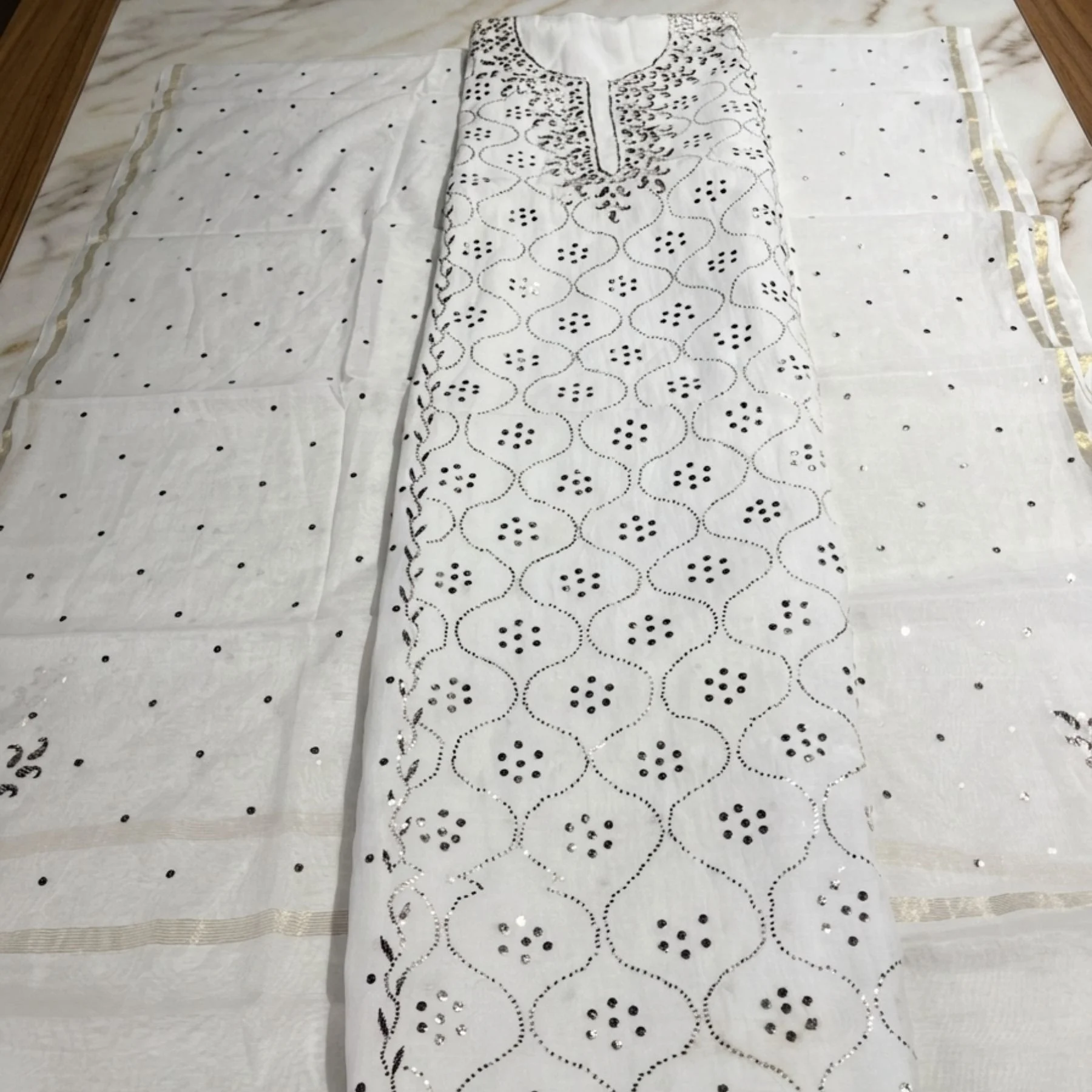 White mul fabric unstitched suit for women
