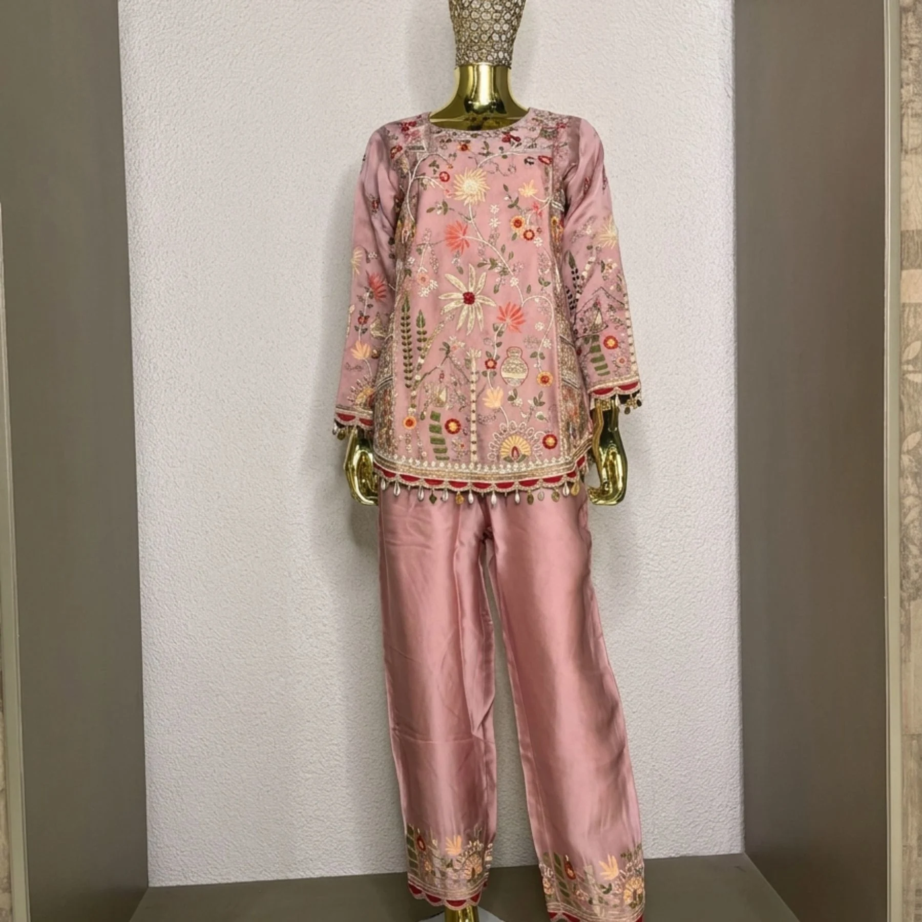 Woman wearing blush pink khadi chanderi suit set with dupatta