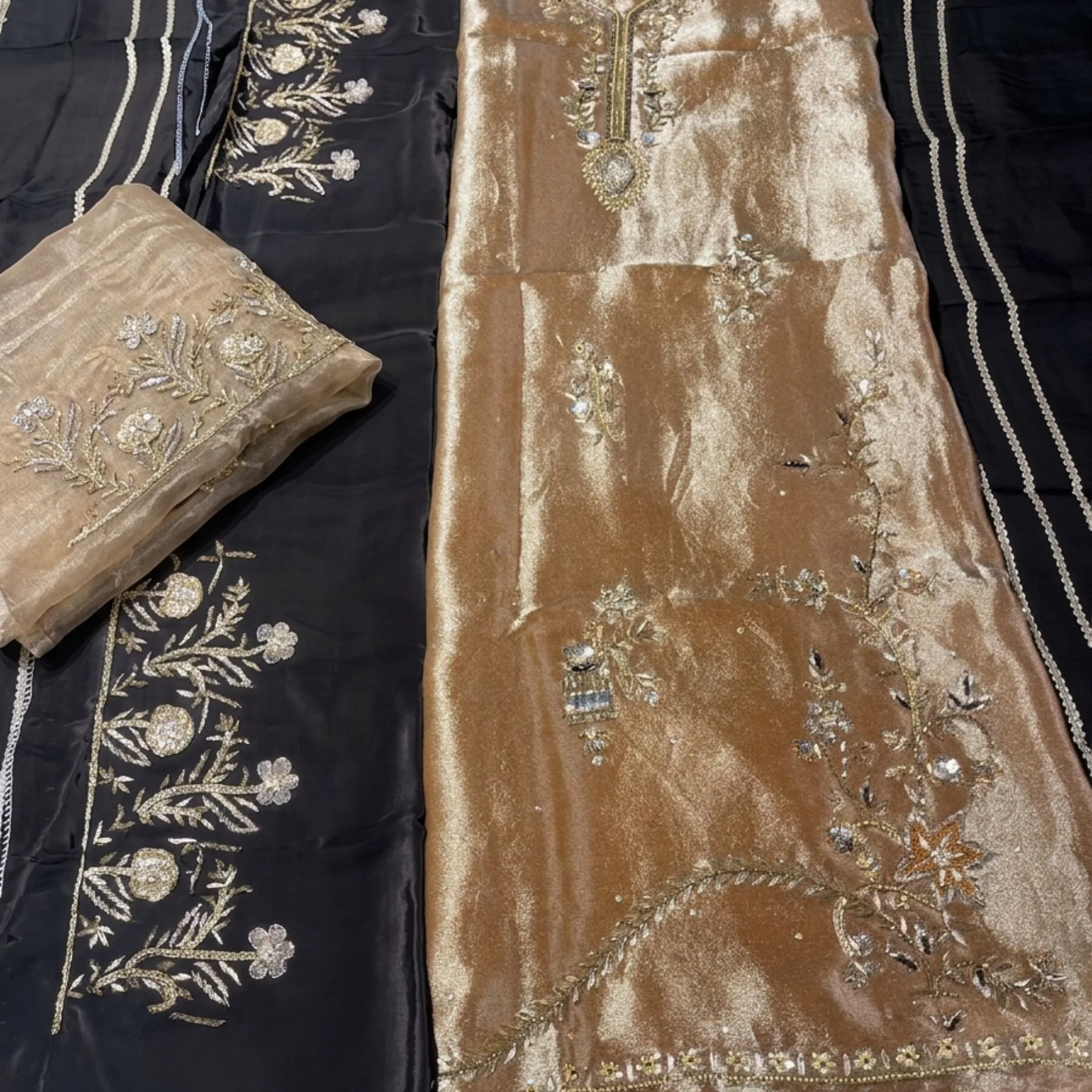 Women’s golden shimmer unstitched suit with dabka work