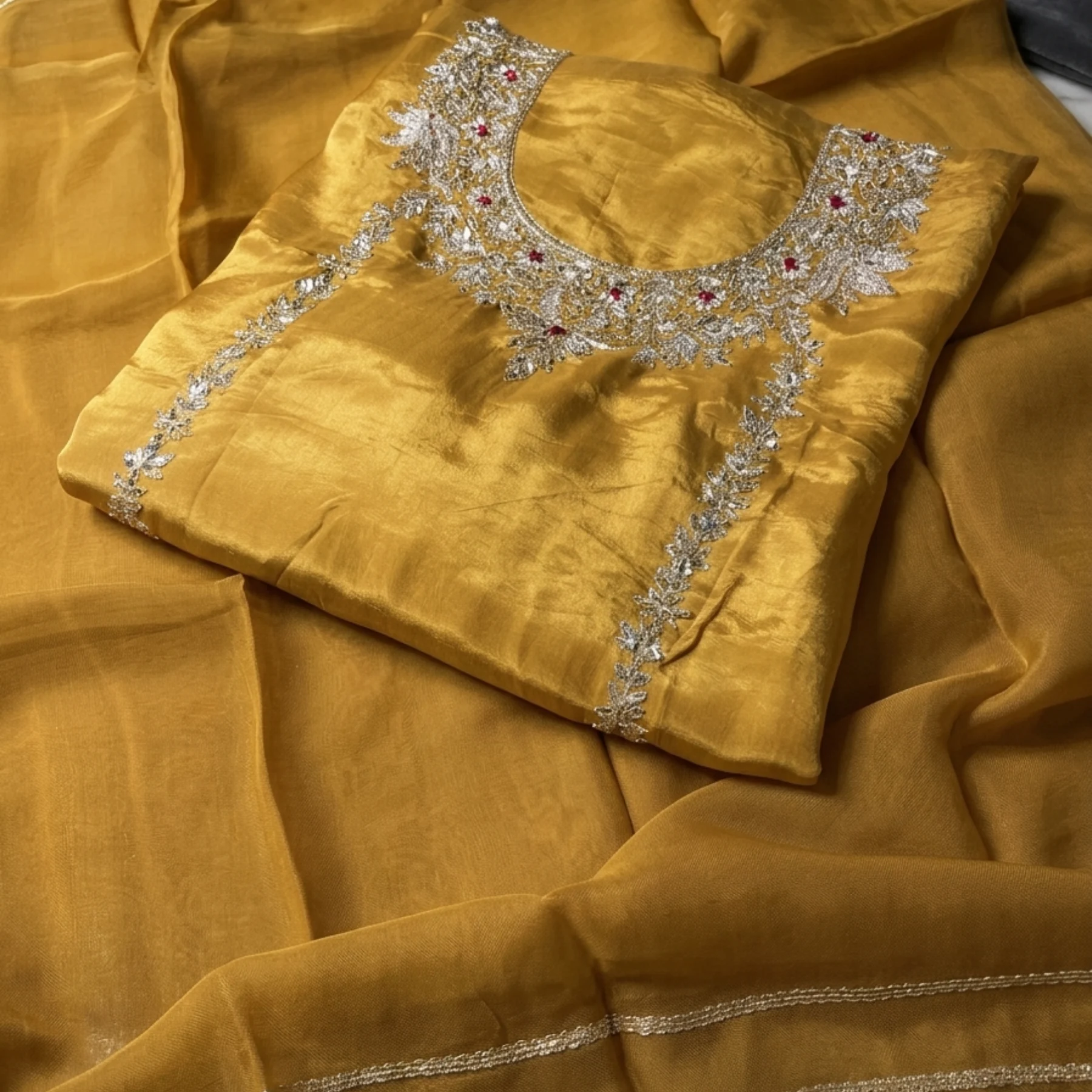 Women’s mustard unstitched suit with dabka work