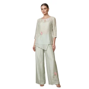 Woman wearing mint green organza thread work co-ord set