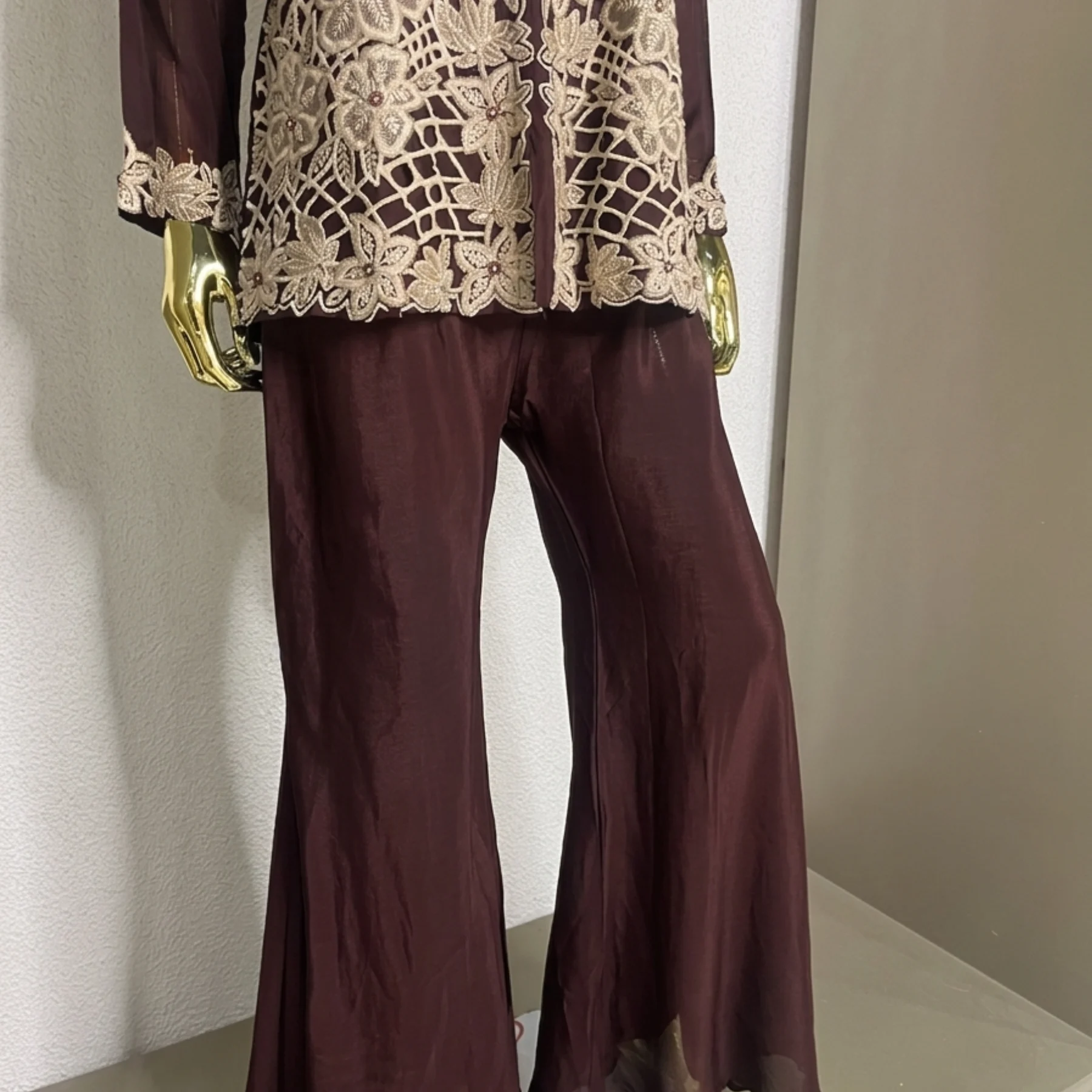 Woman wearing chinnon co-ord set with thread work embroidery