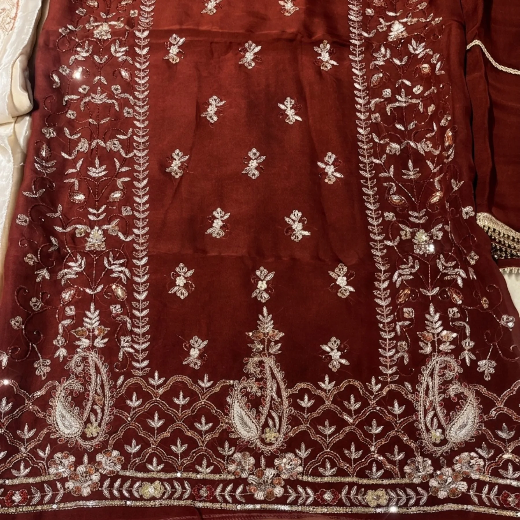Women’s maroon crepe embroidered unstitched suit