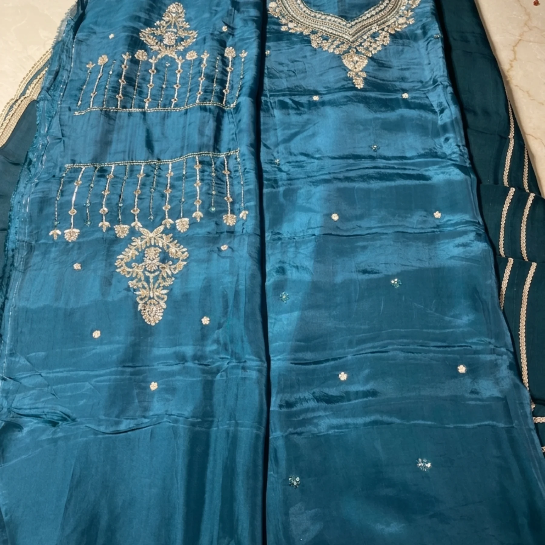 Women’s teal blue crepe unstitched suit with diamond work
