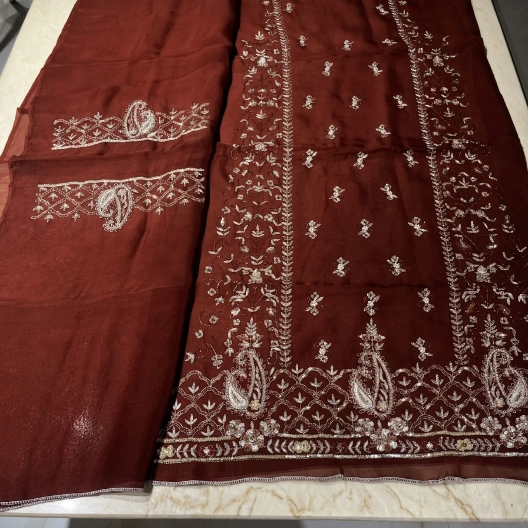 Women’s maroon crepe embroidered unstitched suit