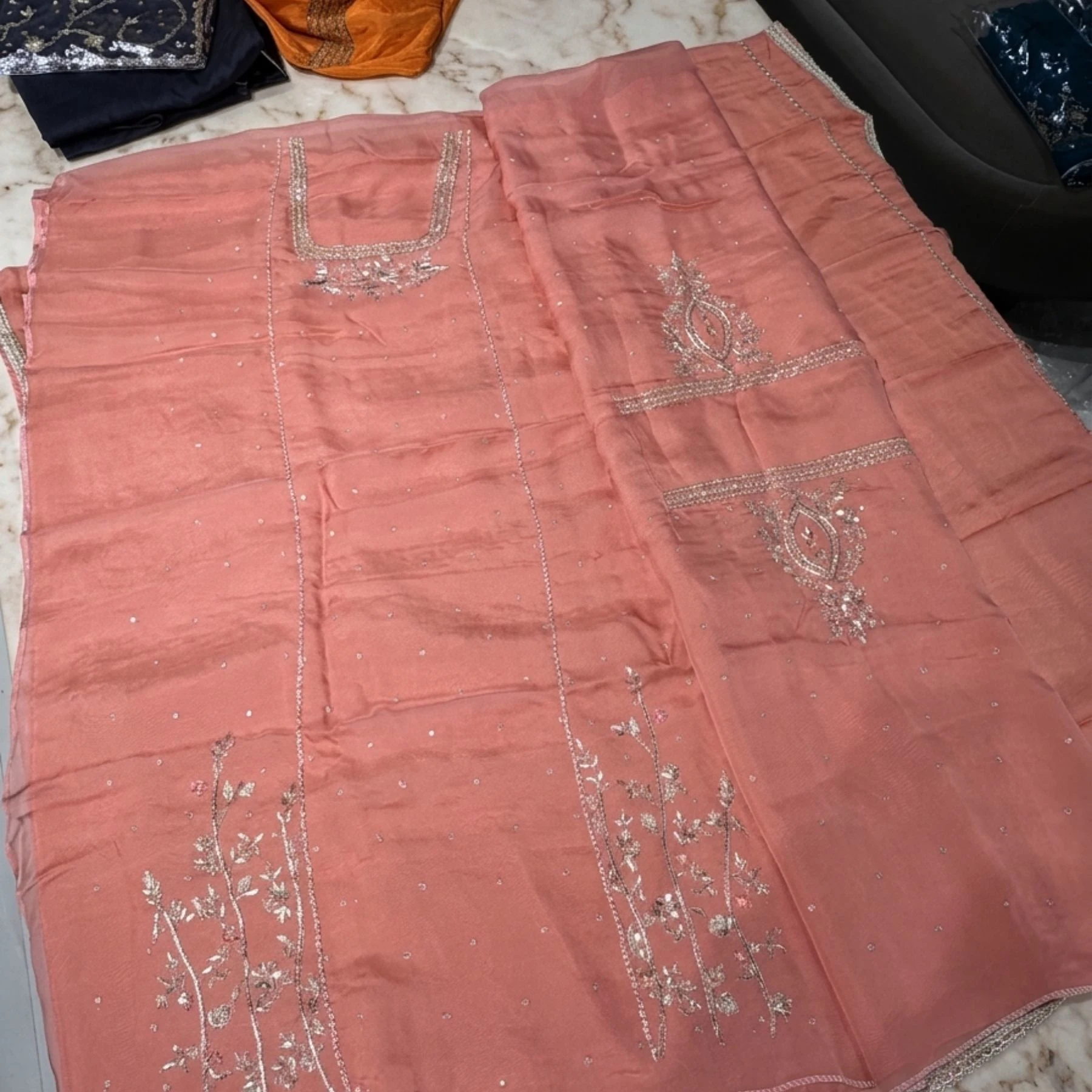 Pink organza unstitched suit with sippi cut daana and dabka work by Kharatis