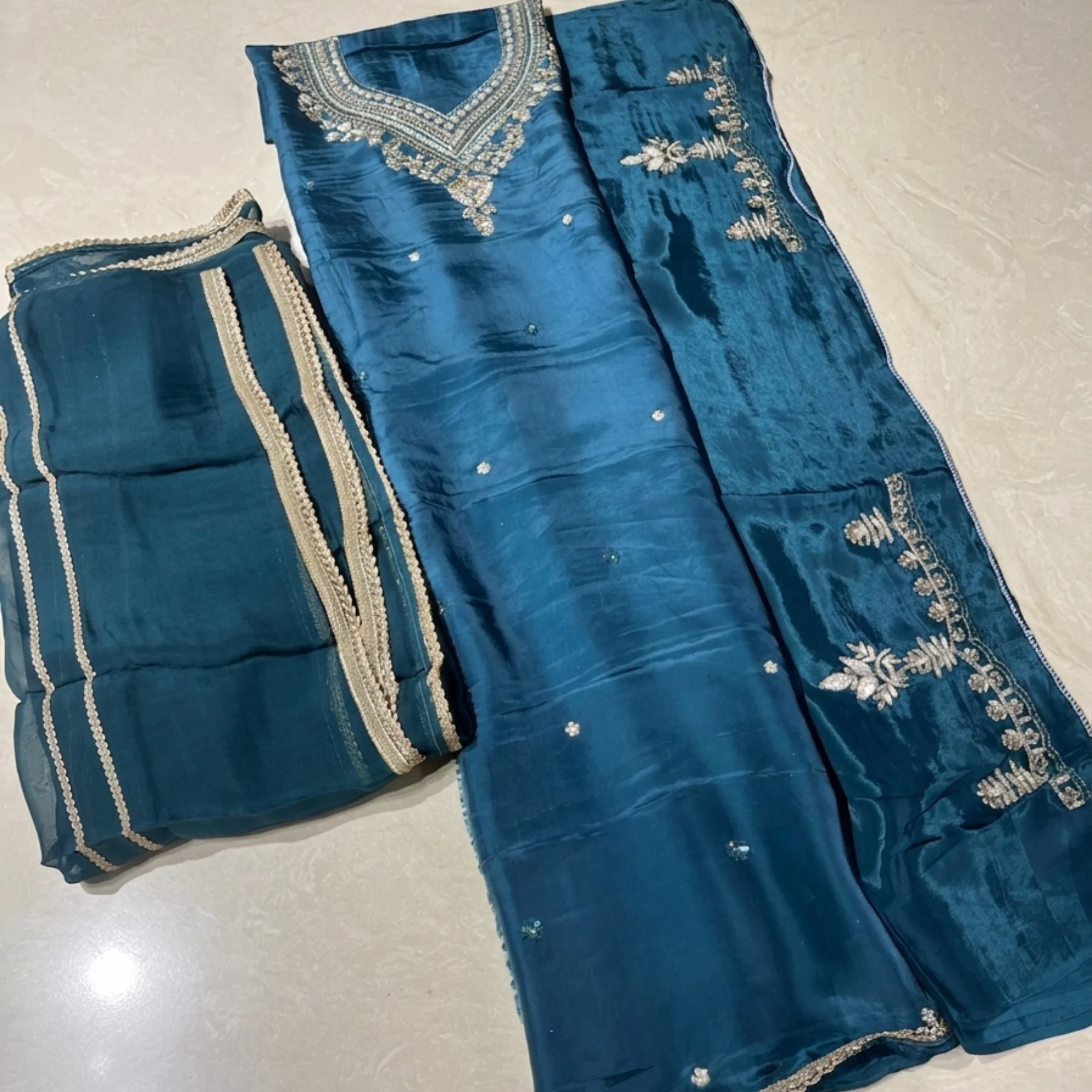 Women’s teal blue crepe unstitched suit with diamond work