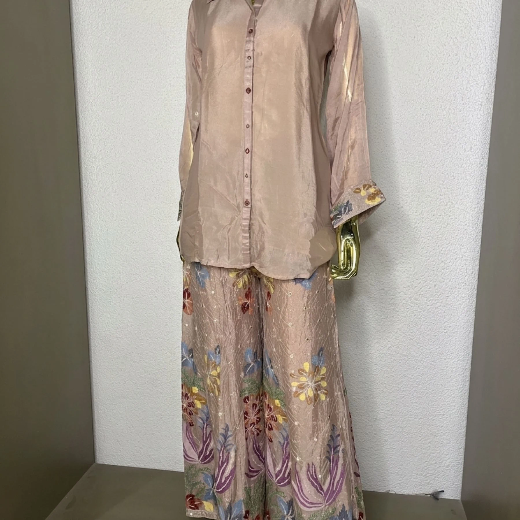 Woman wearing blush pink chinnon embroidered sharara co-ord set