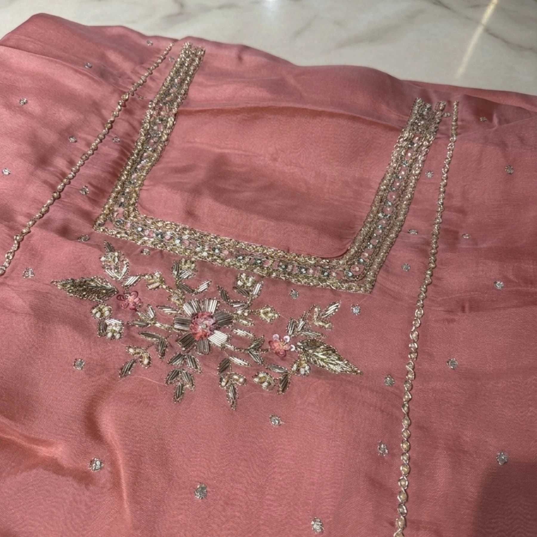 Pink organza unstitched suit with sippi cut daana and dabka work by Kharatis