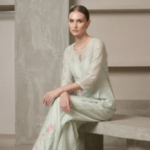 Woman wearing mint green organza thread work co-ord set