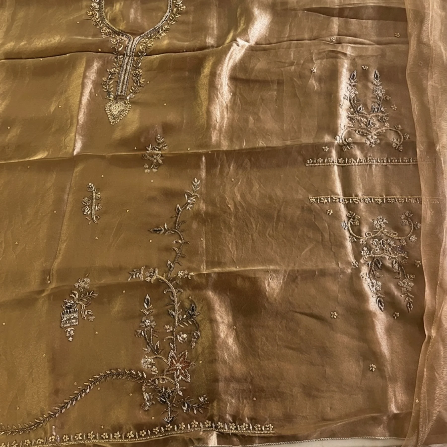 Women’s golden shimmer unstitched suit with dabka work