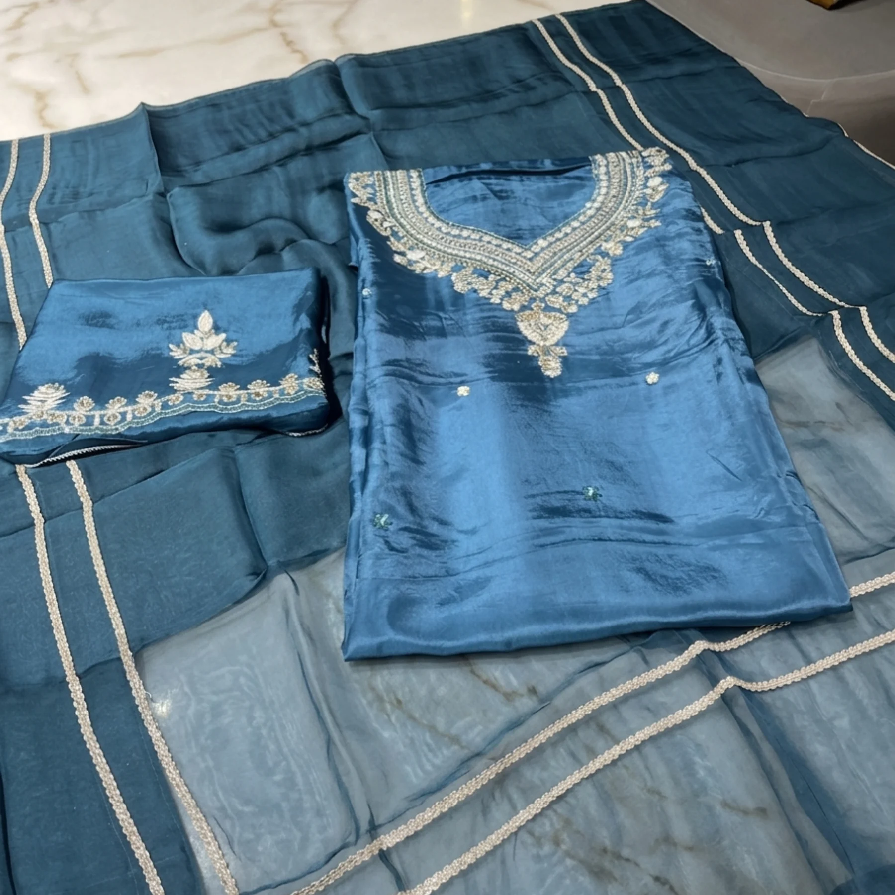 Women’s teal blue crepe unstitched suit with diamond work