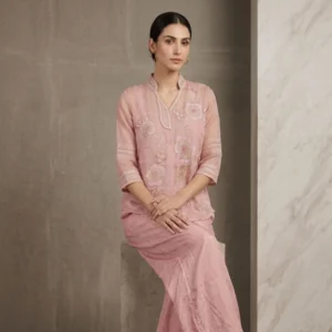 Woman wearing blush pink soft organza embroidered co-ord set