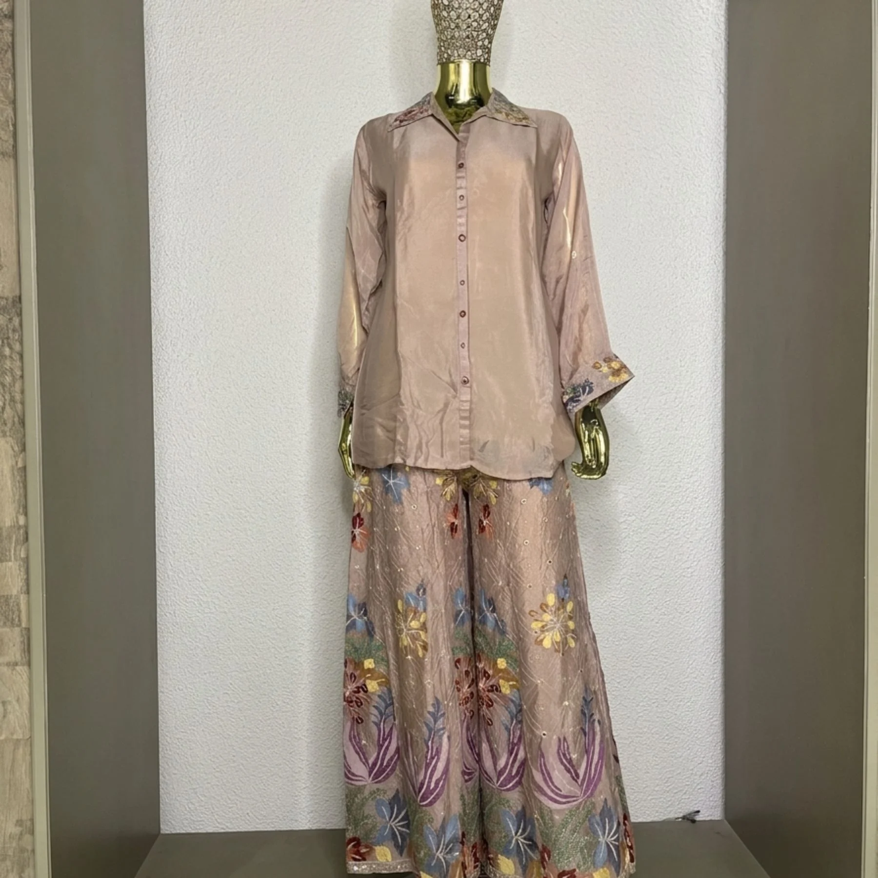 Woman wearing blush pink chinnon embroidered sharara co-ord set