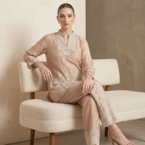 Woman wearing beige chinnon thread work co-ord set