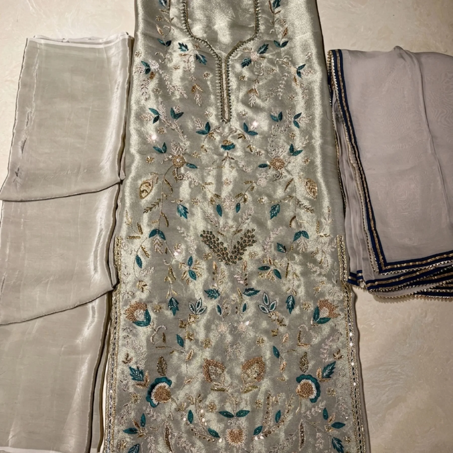 Women’s golden shimmer embroidered unstitched suit
