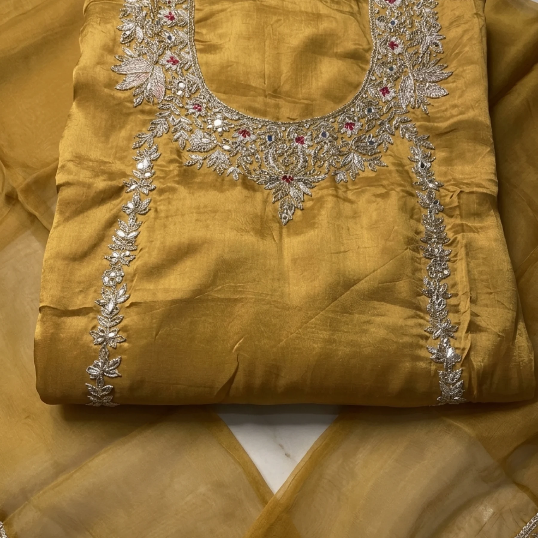 Women’s mustard unstitched suit with dabka work