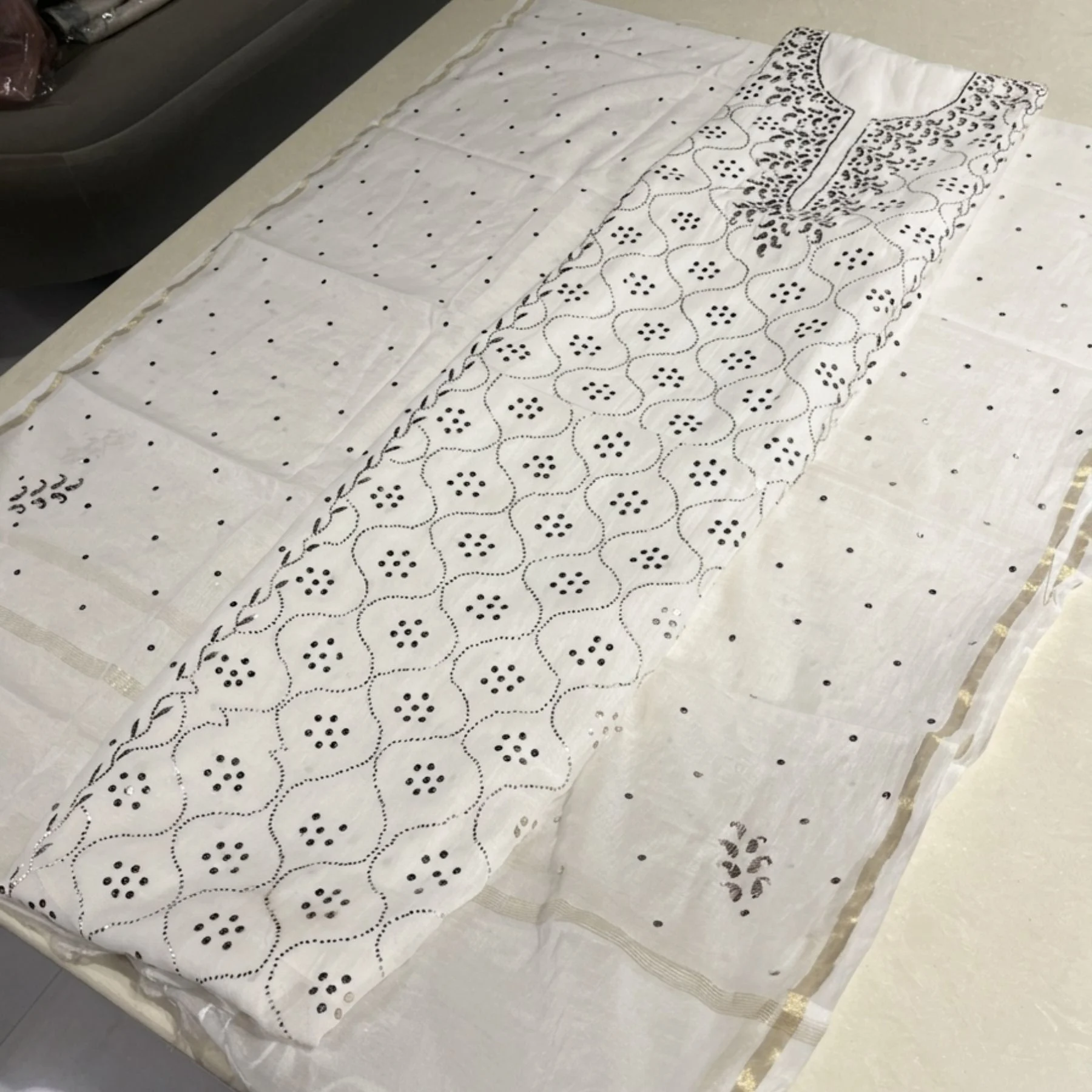 White mul fabric unstitched suit for women