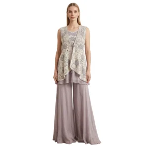 Woman wearing lavender chinnon co-ord set with embroidered organza jacket