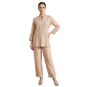 Woman wearing beige organza embroidered co-ord set with sippy work