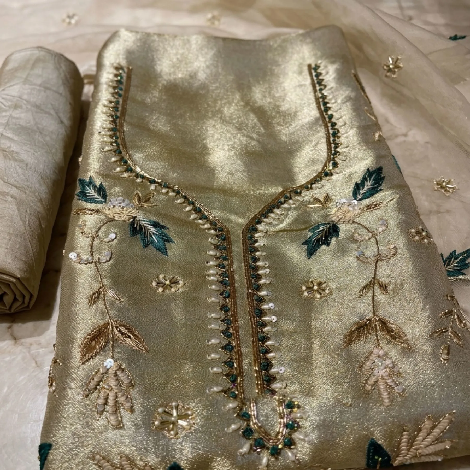 Women’s golden shimmer embroidered unstitched suit