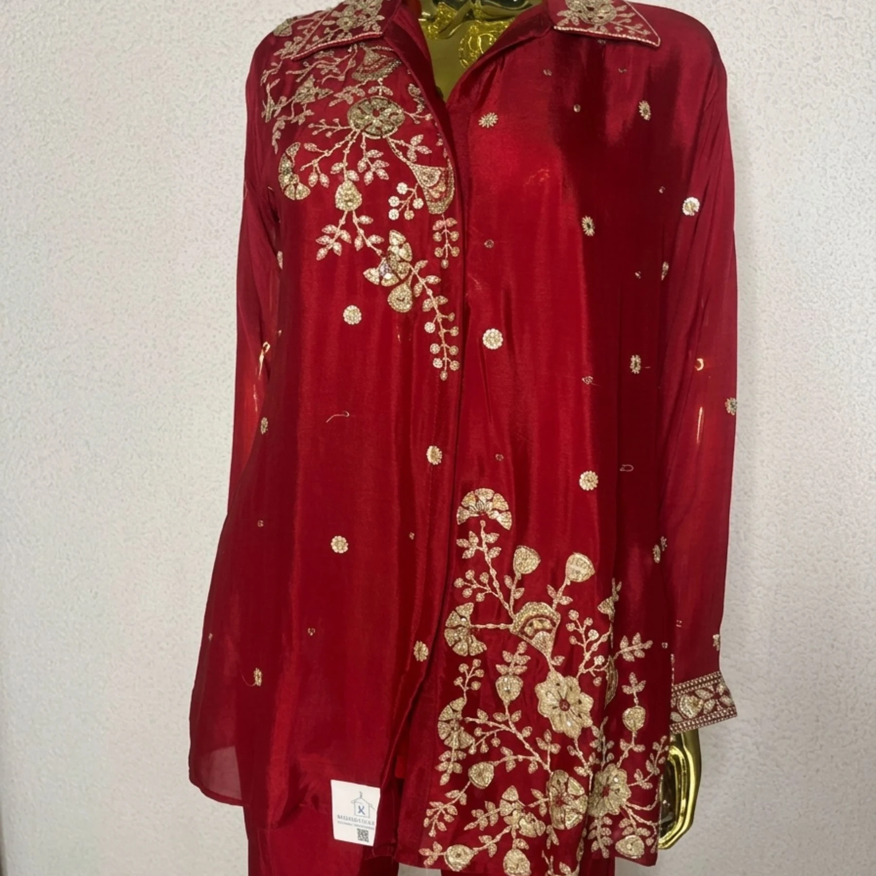 Woman wearing wine chinnon zari work embroidered co-ord set