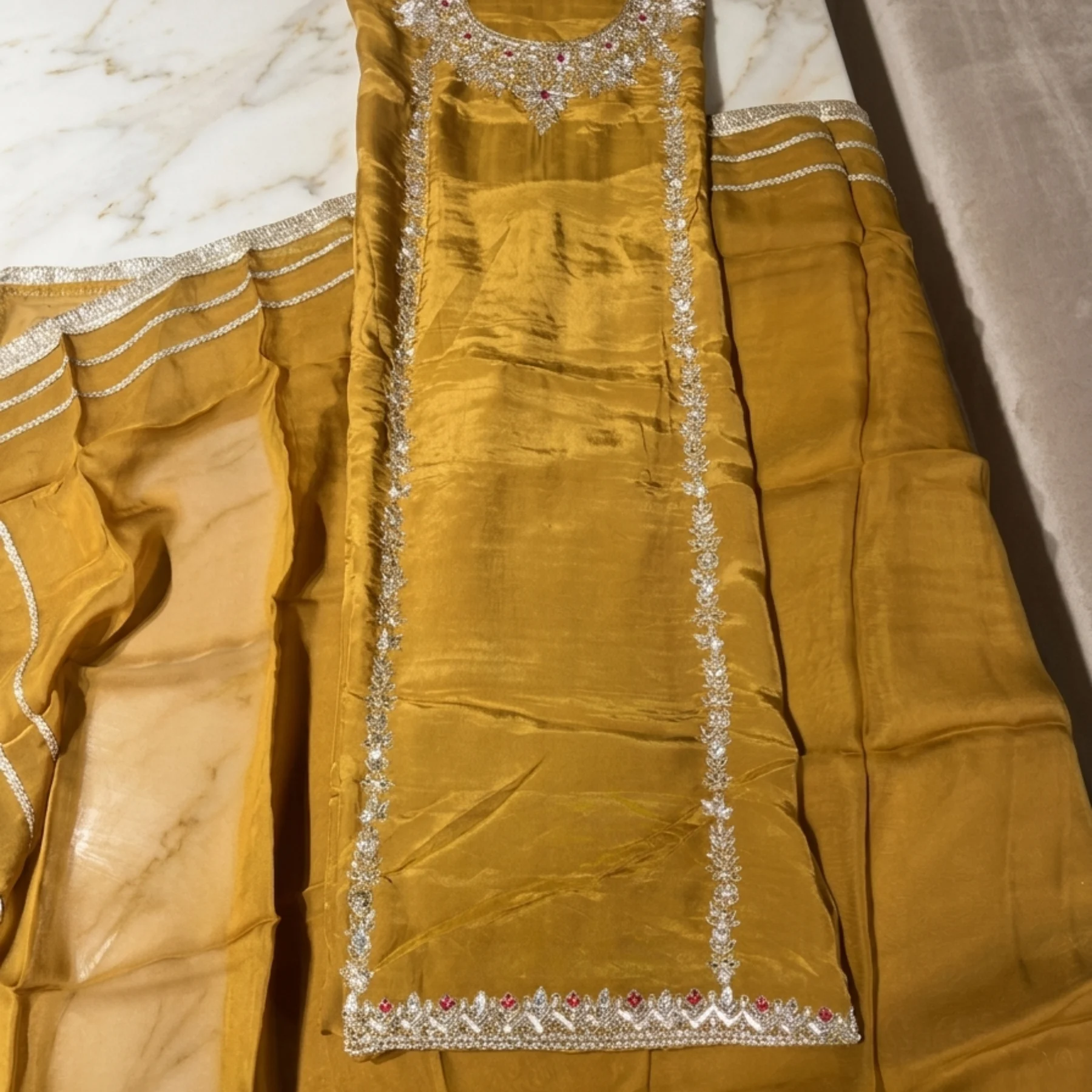 Women’s mustard unstitched suit with dabka work