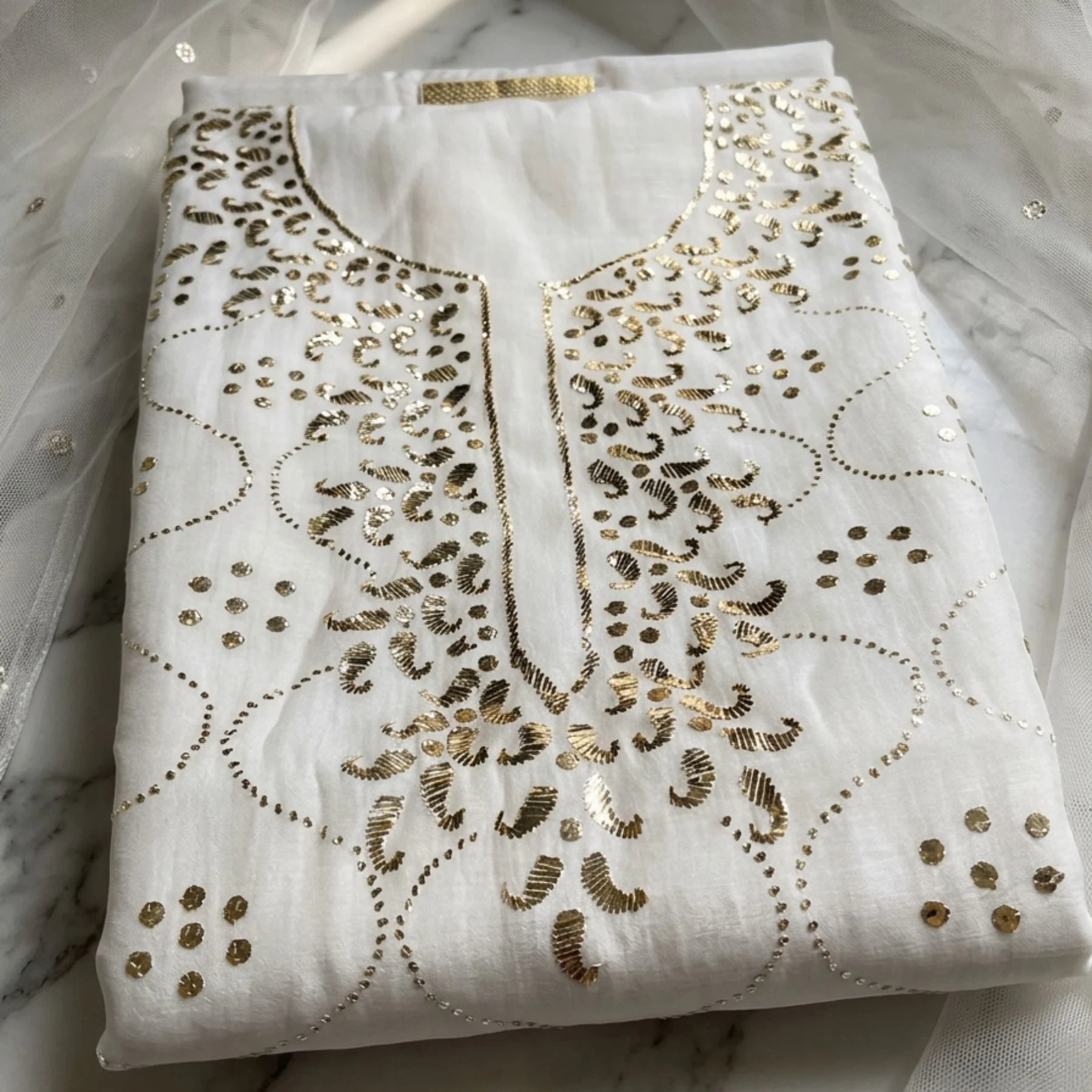 White mul fabric unstitched suit for women