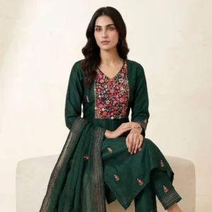 Bottle green georgette unstitched suit with thread work on neck by Kharatis