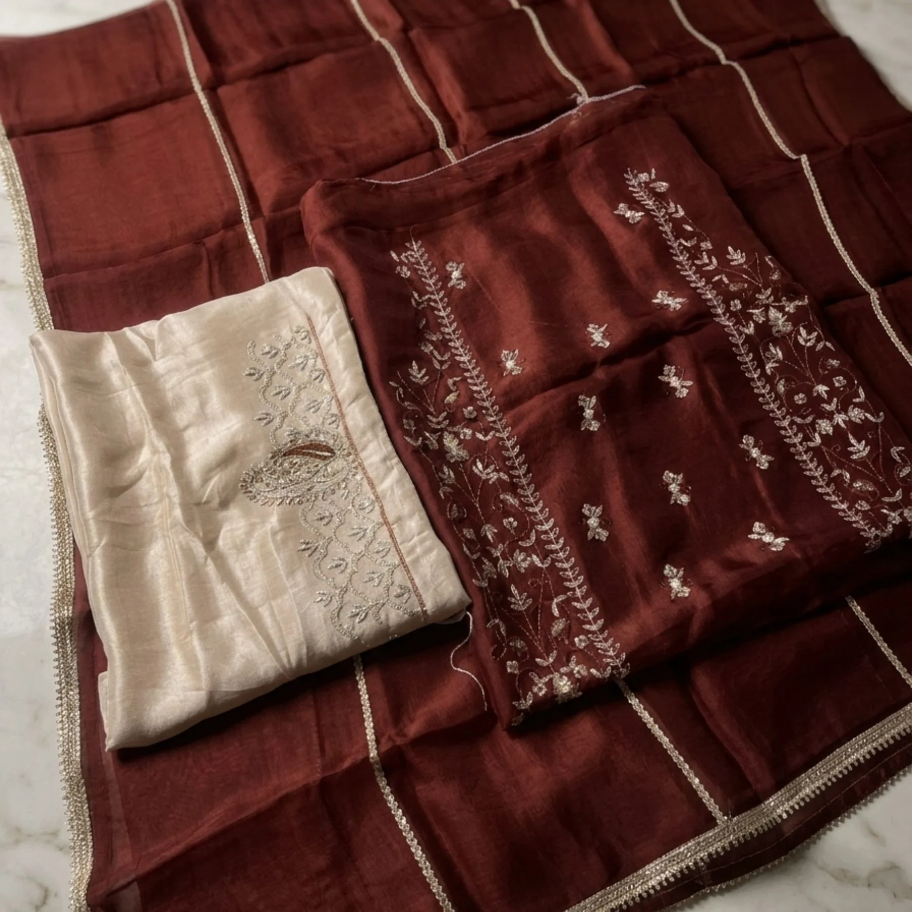 Women’s maroon crepe embroidered unstitched suit