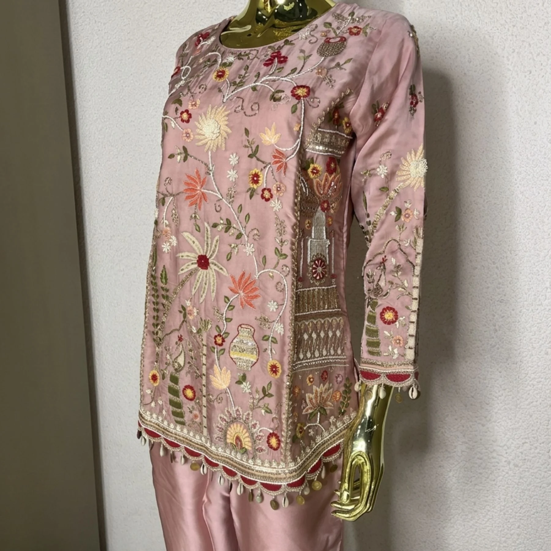Woman wearing blush pink khadi chanderi suit set with dupatta