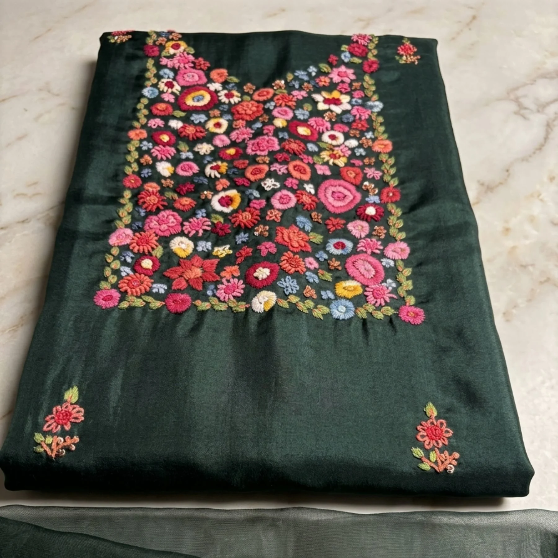 Bottle green georgette unstitched suit with thread work on neck by Kharatis