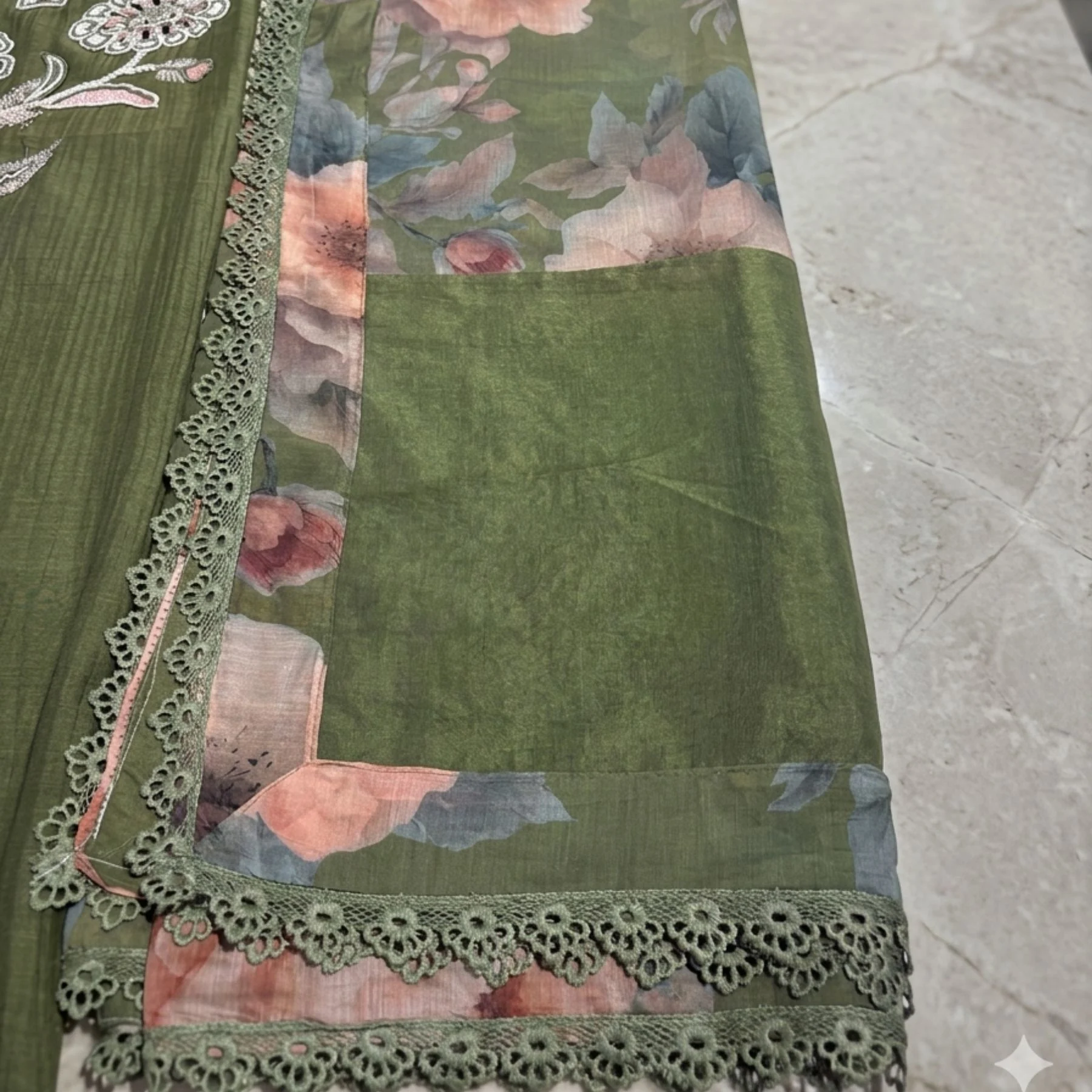 Rich olive green unstitched suit with floral embroidery, thread work and bead work by Kharatis