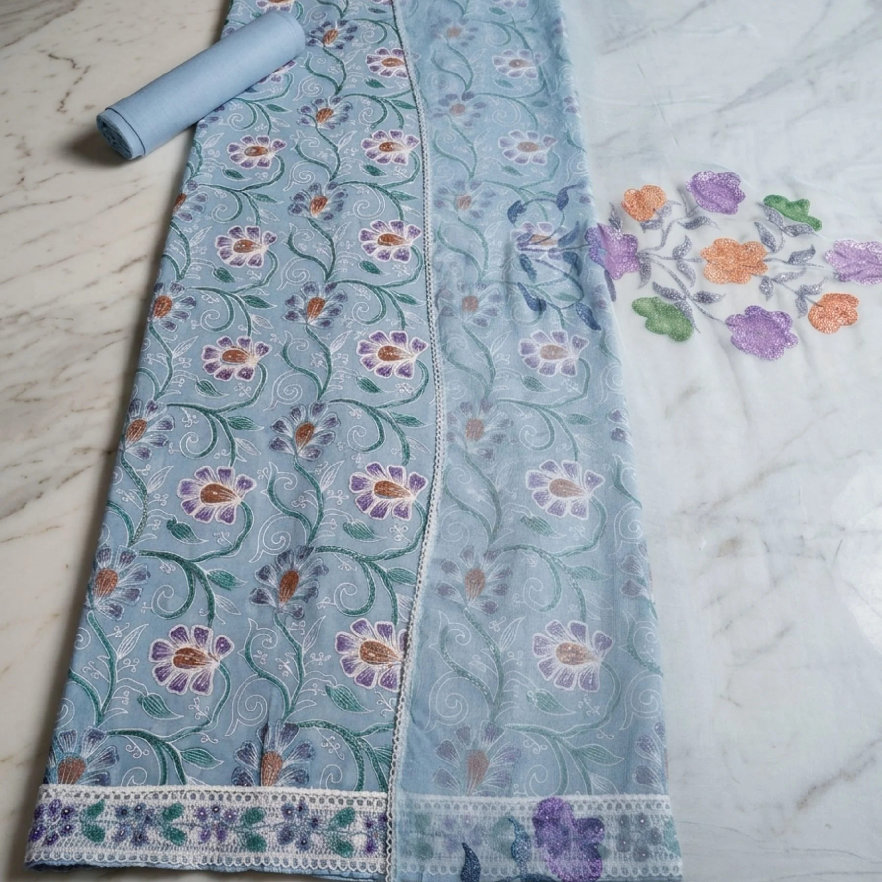 Light sky blue cambric cotton unstitched suit with paint work by Kharatis