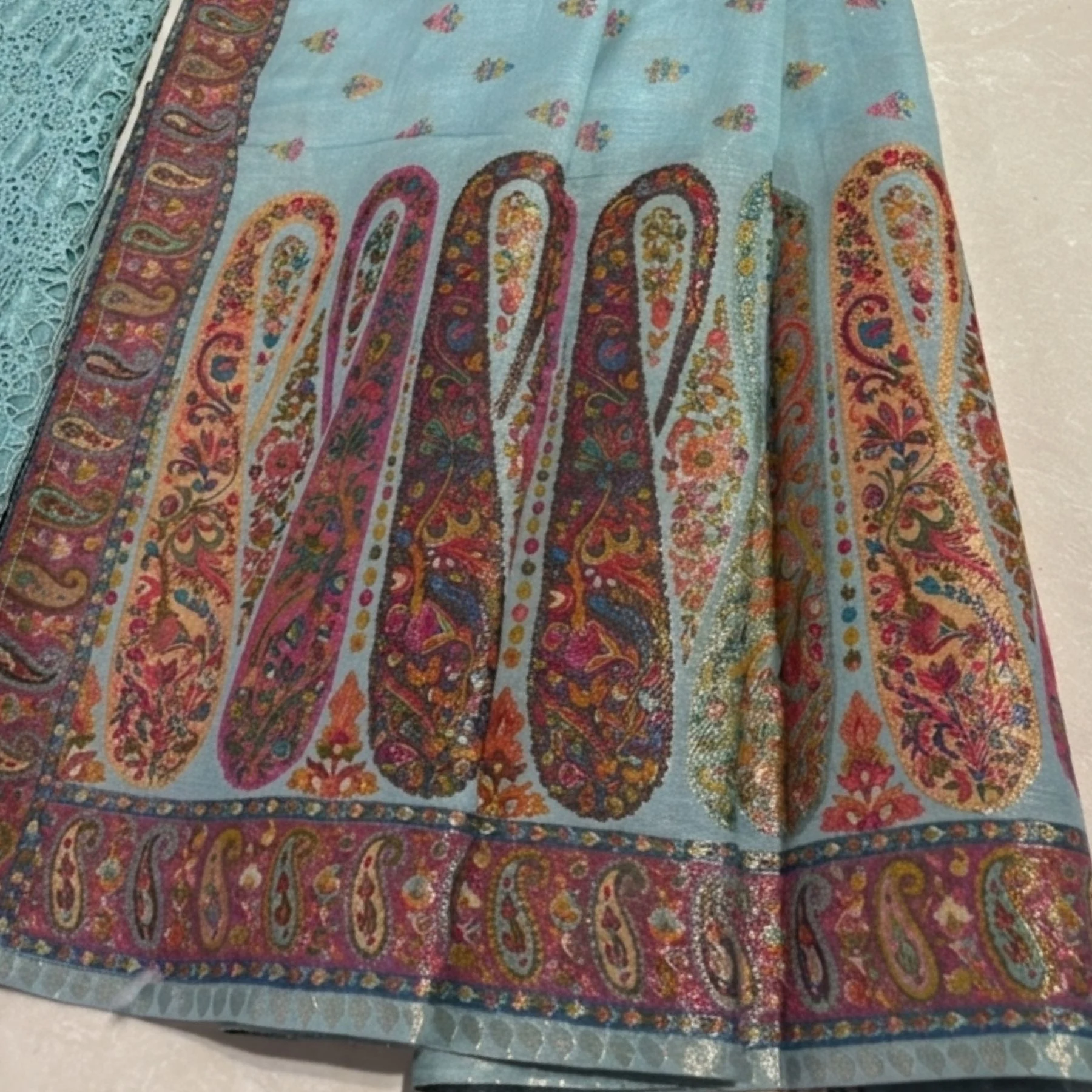 Mint turquoise unstitched suit with jaal embroidery and thread work pattern by Kharatis