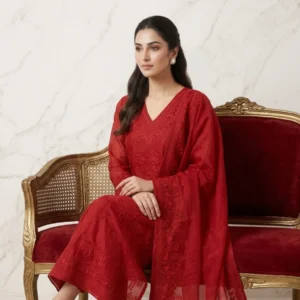 Rich vibrant red unstitched suit with structured embroidery on neck and dupatta by Kharatis