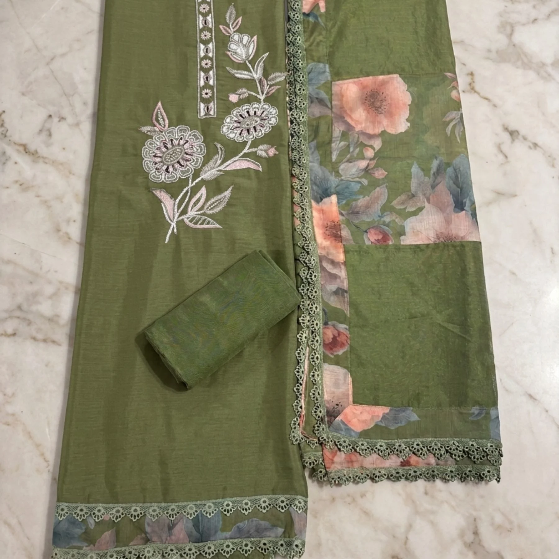 Rich olive green unstitched suit with floral embroidery, thread work and bead work by Kharatis